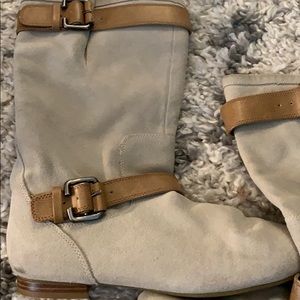 Tan and brown buckle boots